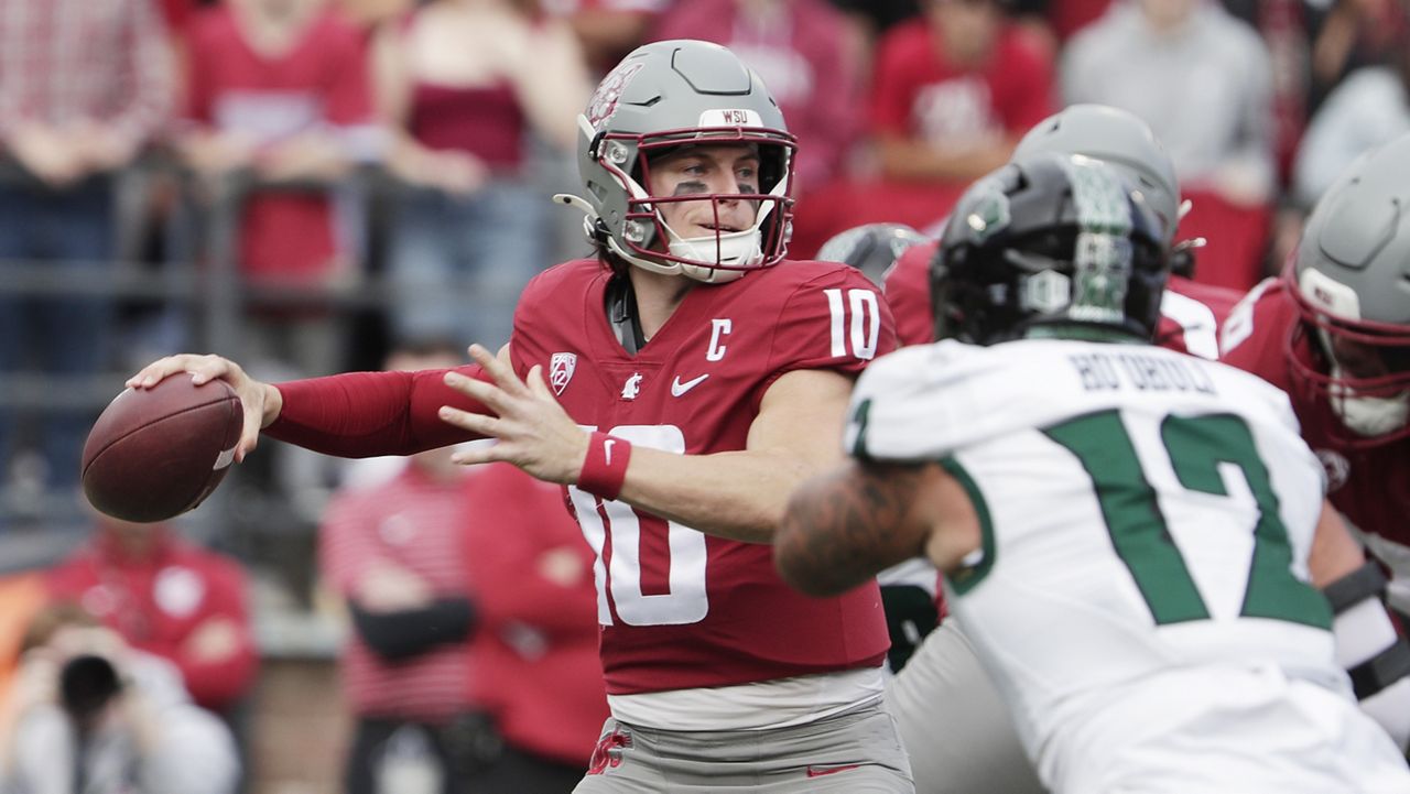 Washington State quarterback John Mateer threw a pass during the first half against Hawaii in Pullman, Wash., on Saturday.