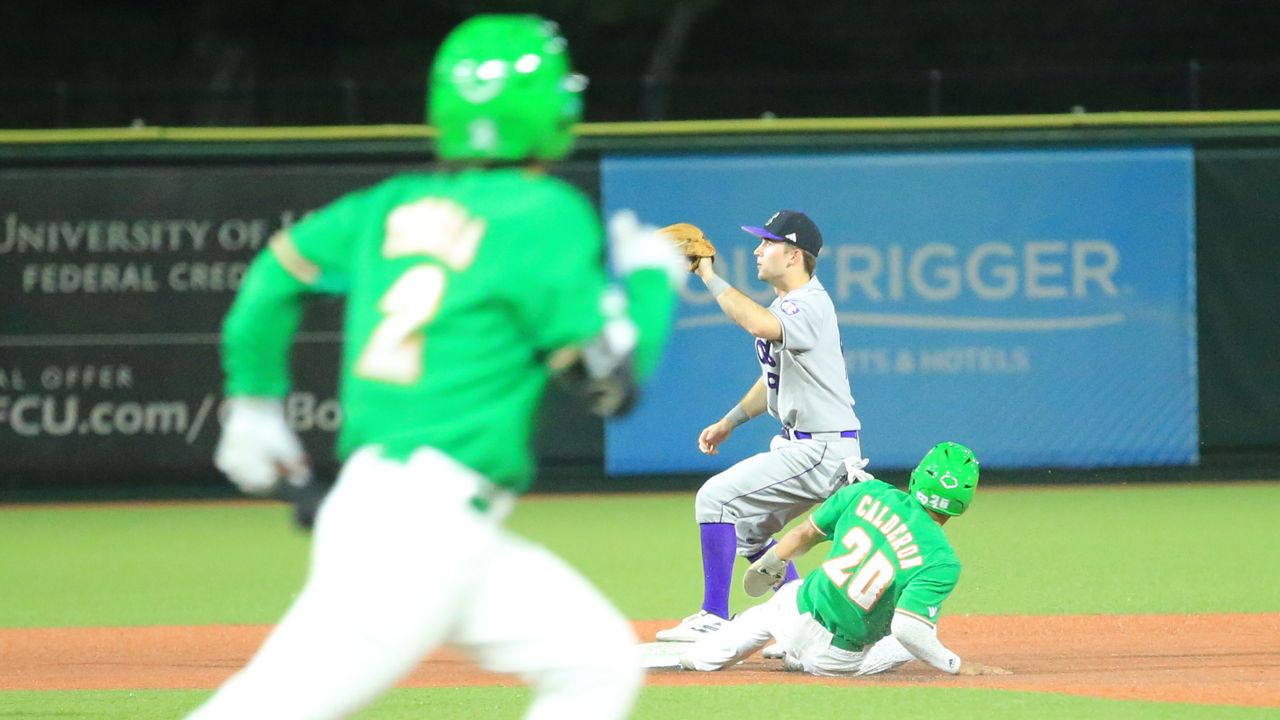 Naighel Ali‘i Calderon slid into second base as Jake Tsukada sprinted down the first-base line against Holy Cross on Friday night.