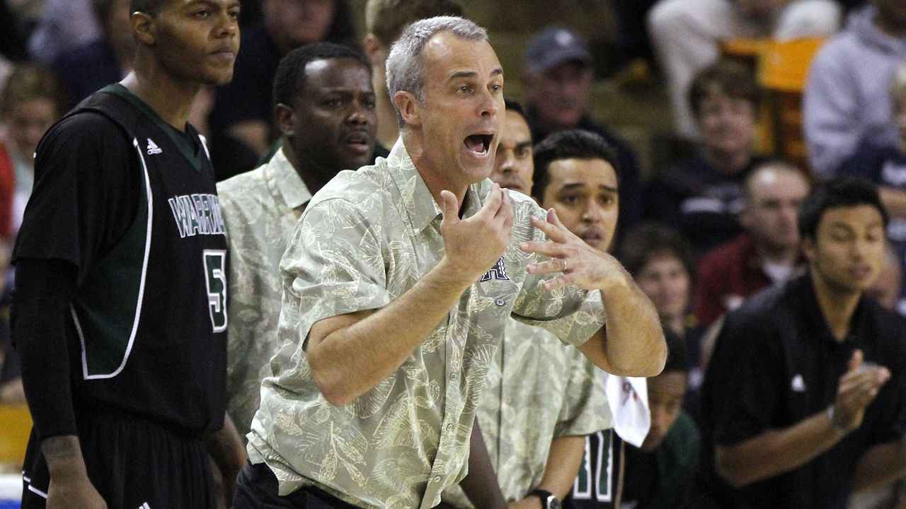 Former Hawaii men's basketball coach Gib Arnold coached the Rainbow Warriors at Utah State on Jan. 26, 2012.