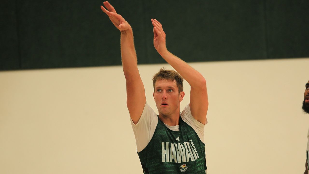 Hawaii center Tanner Christensen, seen on the first day of practice at UH's Gym II in late September, had the game-winning three-point play in a preseason exhibition against Hawaii Hilo in Afook-Chinen Civic Auditorium on Friday night.