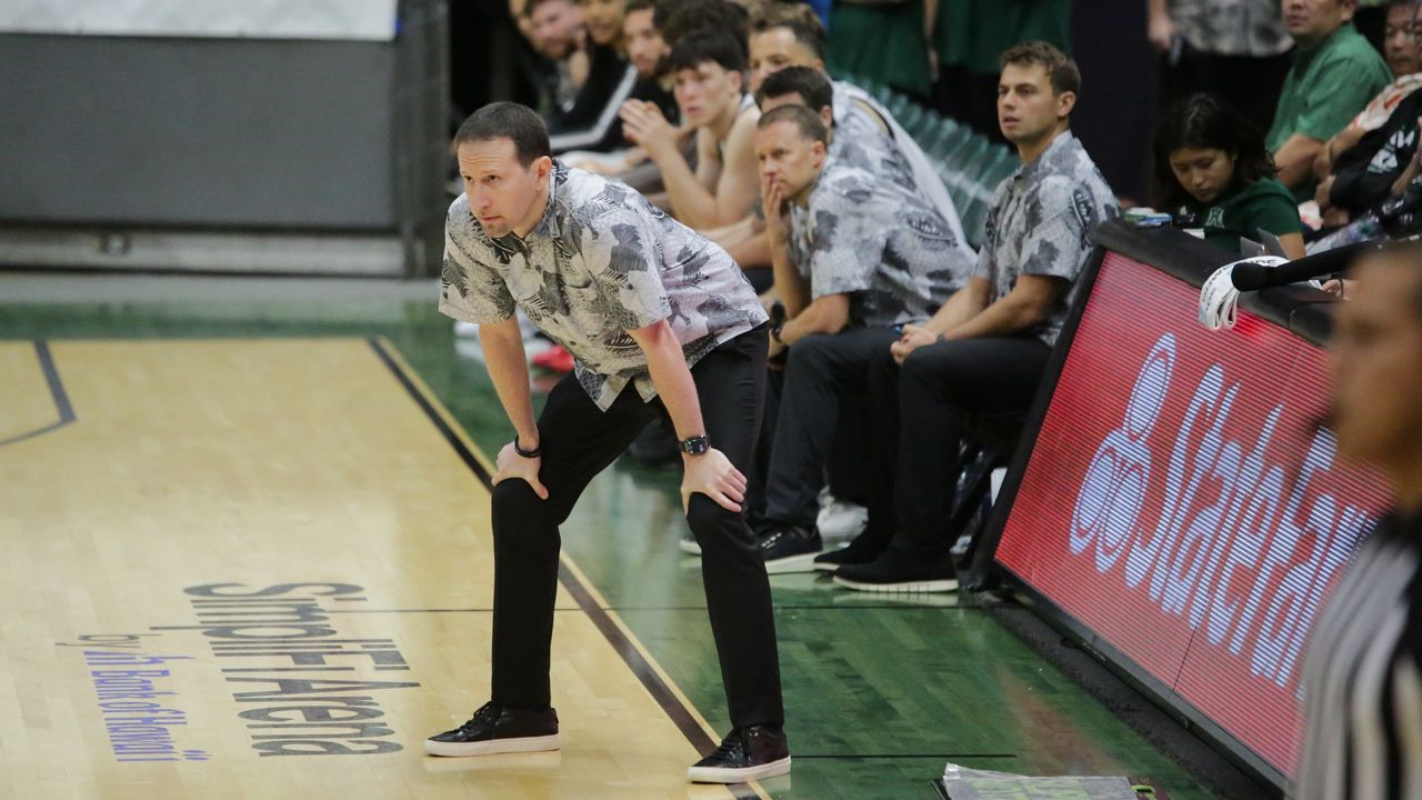 Hawaii men's basketball coach Eran Ganot, left, brought in the program's first recruit from Italy with the signing of Jacopo Van der Knaap.