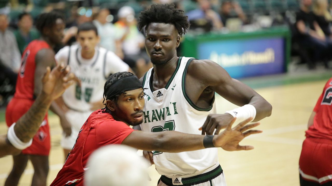 Hawaii center Mor Seck, seen against Hawaii Hilo in the 2023-24 season opener, played 19 games as a sophomore before going down in a practice with an ACL injury.
