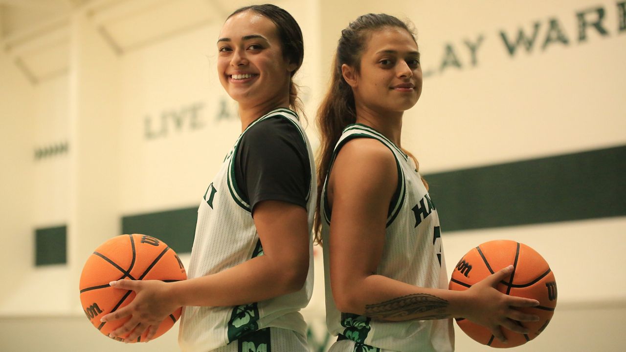 Sisters Jovi Lefotu, left, and Lily Wahinekapu are looking forward to their second season of action together with the Rainbow Wahine basketball team, and first since the 2022-23 season.