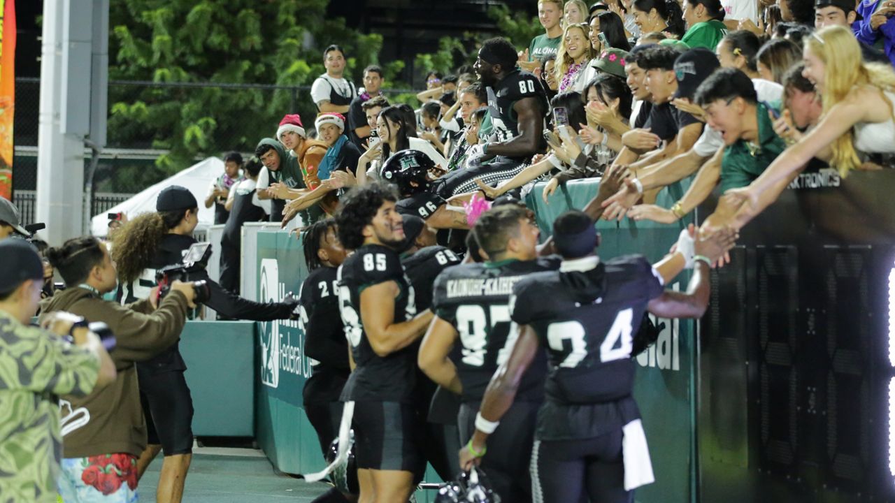 The Hawaii football team celebrated with the student section at the Clarence T.C. Ching Athletics Complex after beating Colorado State on Matthew Shipley's walk-off field goal in the 2023 finale Nov. 25. 