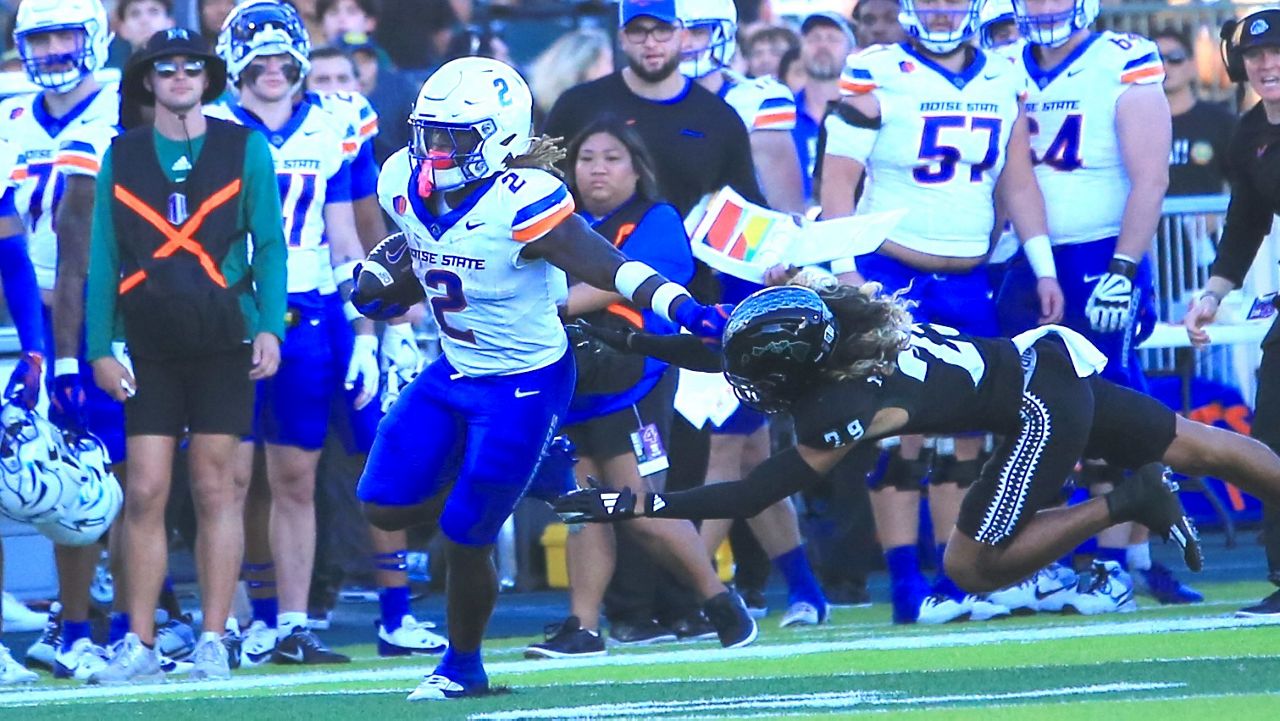 Boise State running back Ashton Jeanty evaded the tackle of Hawaii defensive back Kilinahe Mendiola-Jenson on his way to the end zone for a 54-yard touchdown at the Clarence T.C. Ching Athletics Complex on Saturday.