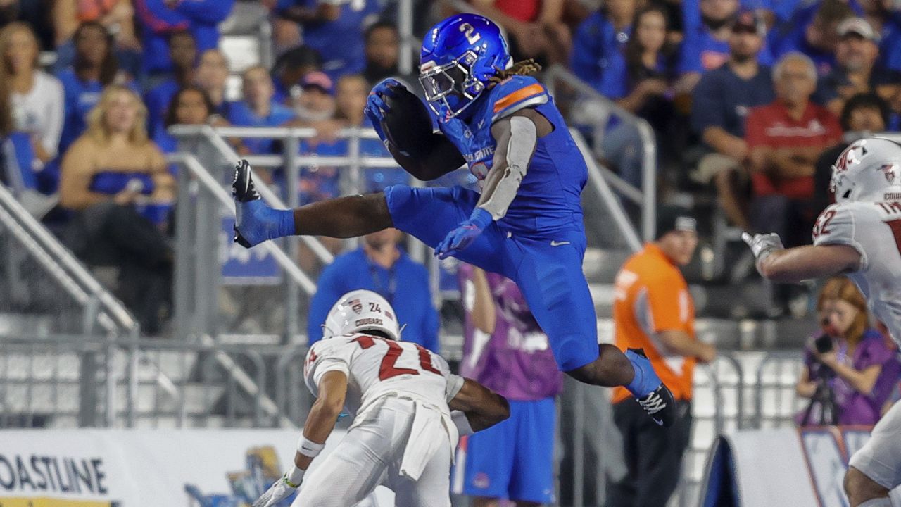 Boise State running back Ashton Jeanty hurdled Washington State defensive back Ethan O'Connor on Sept. 28 at Albertsons Stadium in Boise, Idaho.