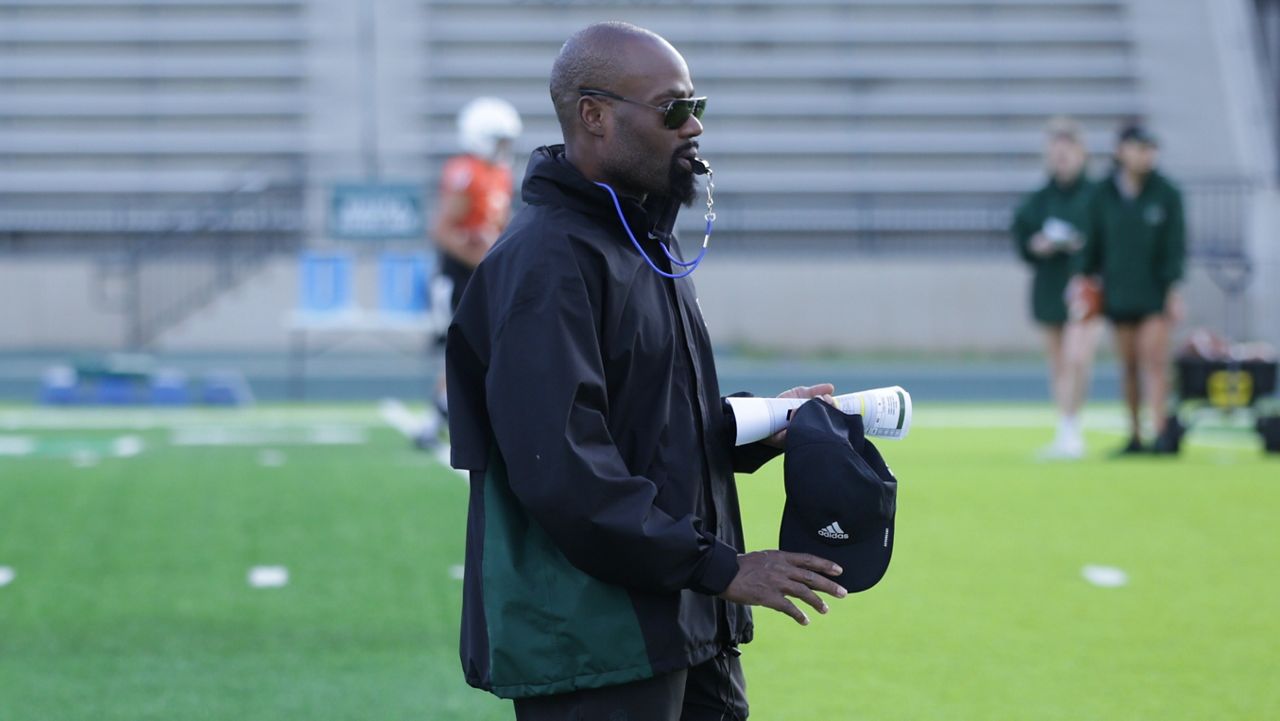 Abraham Elimimian, seen at Hawaii football spring practice in February, was an assistant coach with the Rainbow Warriors since 2015 when he was hired by Norm Chow.