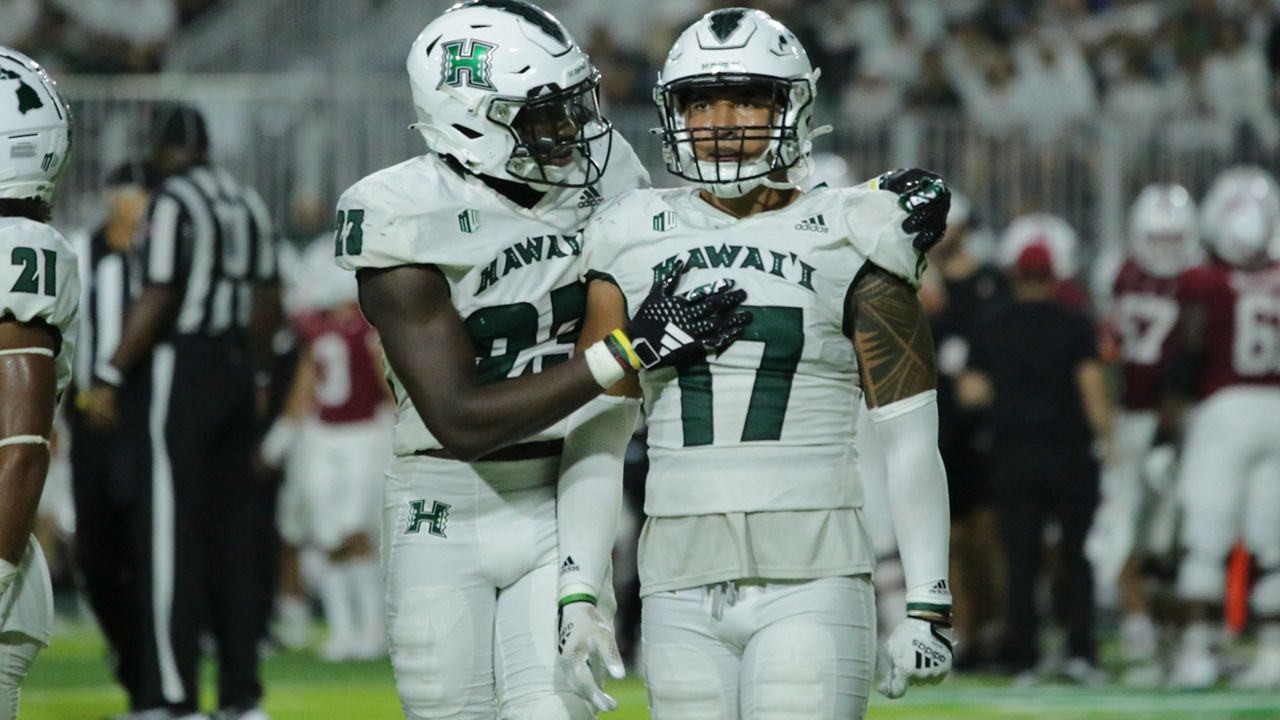 Cornerback Virdel Edwards II consoled linebacker Isaiah Tufaga after the latter was ejected for a targeting penalty in the third quarter against Stanford on Friday night.