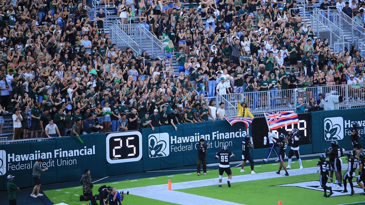 UH students greeted Hawaii football players as they took the field for the 2024 season opener against Delaware State on Saturday.