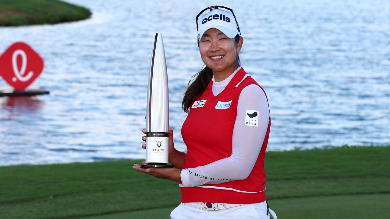 South Korea's A Lim Kim posed with the winner's trophy after winning the LPGA Lotte Championship at Hoakalei Golf Club on Saturday.