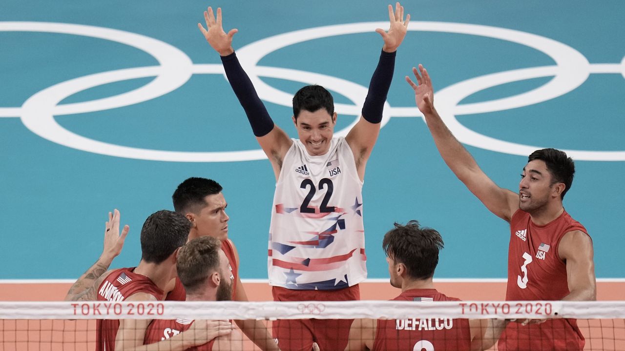 Libero Erik Shoji, top, seen at the 2021 Tokyo Olympics, will participate in his third Olympic games in Paris this summer, it was announced by USA Volleyball on Friday. Below left of Shoji was fellow Hawaii native Micah Christenson, a setter who will also participate in his third Games.