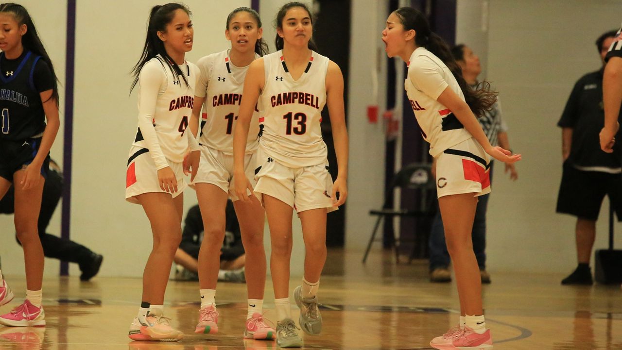 Campbell's Taysia Molina-Schulte (13) and teammates reacted after Molina-Schulte got a key steal against Moanalua in the final seconds of regulation. 