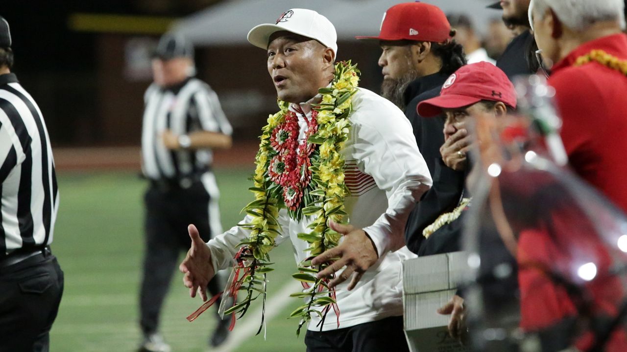 Kahuku football coach Sterling Carvalho, seen at the 2022 HHSAA Open Division championship game against Punahou, took his team to national No. 1 Mater Dei as a tester in the midst of the Oahu Interscholastic Association season.