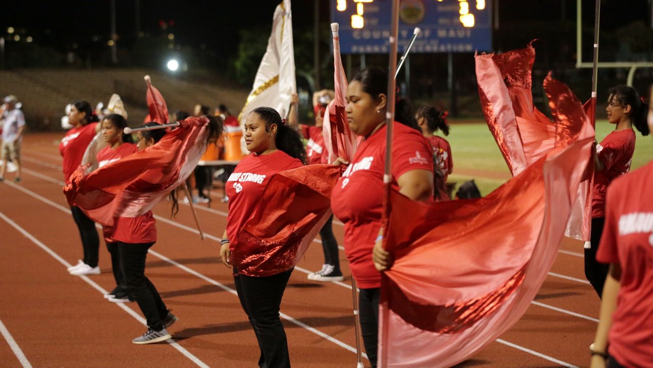 Lahainaluna Color Guard performed facing the Lunas crowd. (Spectrum News/Brian McInnis)