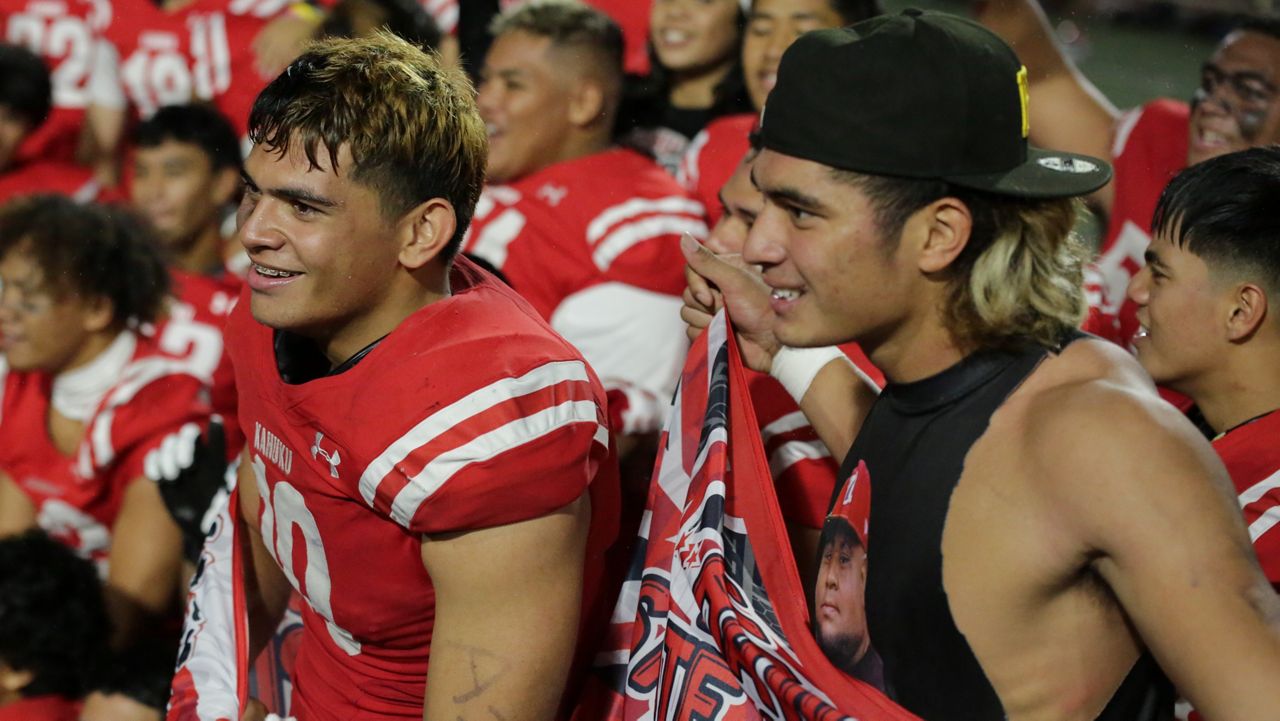 Kahuku linebackers Liona Lefau and Leonard Ah You, seen in a celebration after beating Punahou for the state Open Division championship in November, were two of the Red Raiders' three football inductees into the 2023 Hawaii High School Hall of Honor, along with safety Brock Fonoimoana.