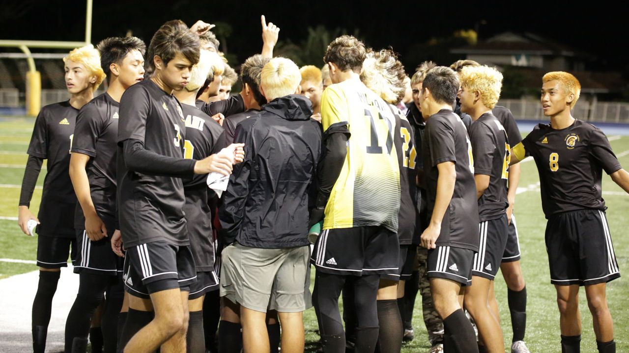 The Mililani boys soccer team after its 2023 OIA championship. The Trojans will go for a third straight title against Campbell on Saturday, January 27, 2024. (Spectrum News/Brian McInnis) 