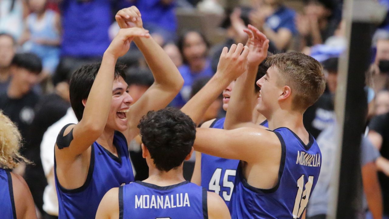Moanalua's Kai Rodriguez, left, and Zack Yewchuk, right, and Justin Todd (45), behind, were each named first-team AVCA High School All-Americans on Wednesday.