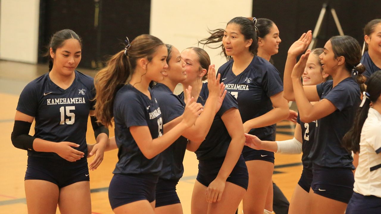 Kamehameha players celebrated after Iolani called a timeout in Set 1 of the teams' ILH tournament match at the Raiders' gym on Thursday night.