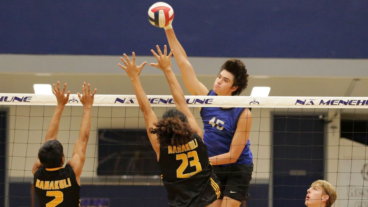 Moanalua hitter and Hawaii signee Justin Todd elevated for a kill against Nanakuli in the OIA quarterfinals at Moanalua on Thursday night.