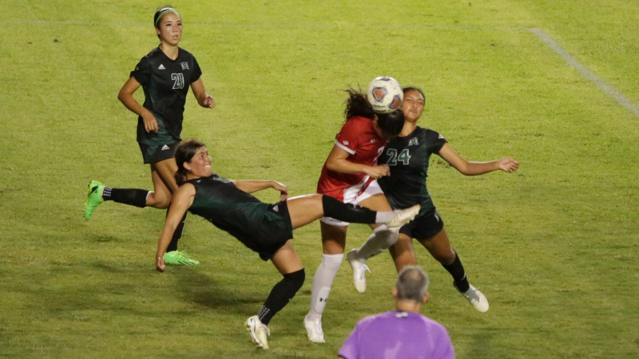 The Hawaii defense, seen against Cal State Northridge, had to scrap for a draw at Cal State Fullerton on Thursday.