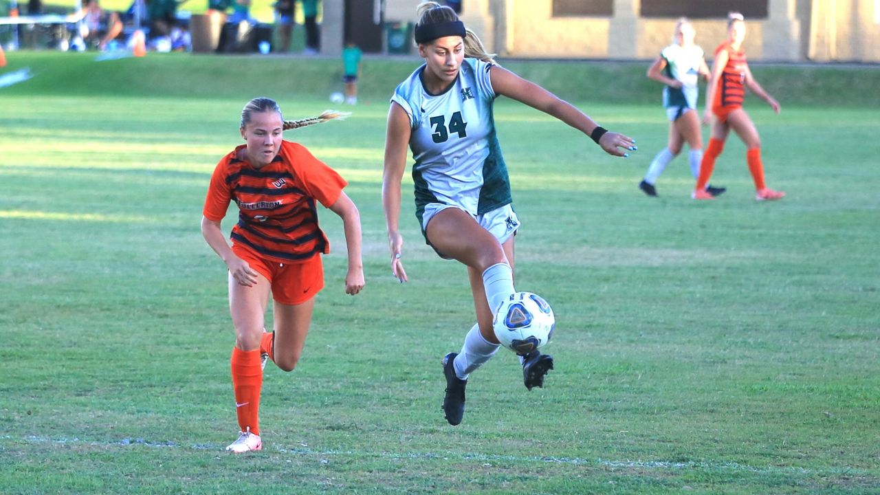 Hawaii soccer midfielder Nalani Damacion, middle, controlled the ball against Cal State Fullerton on Sunday. Damacion had her fifth game-winner of the season at UC San Diego on Thursday.