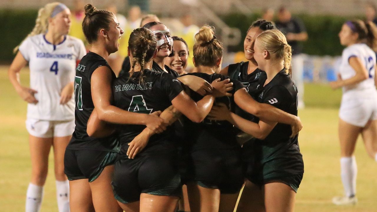 Hawaii soccer players surrounded Fabiola Zamora, third from right, after her game-winning goal on a penalty kick in the 79th minute against Cal State Bakersfield on Thursday night.