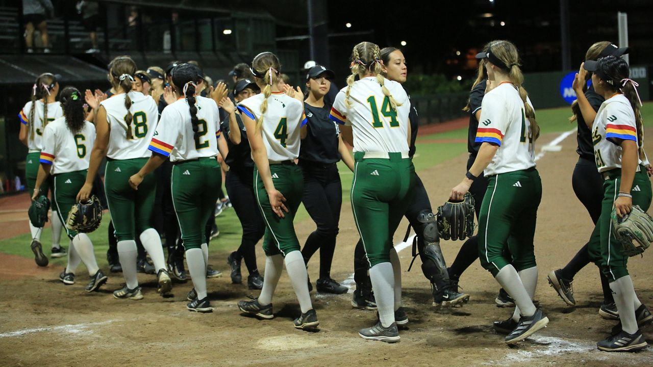 The Hawaii softball team slapped hands with Long Beach State after a win over the Beach at Rainbow Wahine Softball Stadium on March 7. LBSU associate head coach Panita Thanatharn was named the new UH head coach on Wednesday, succeeding 34-year program leader Bob Coolen.