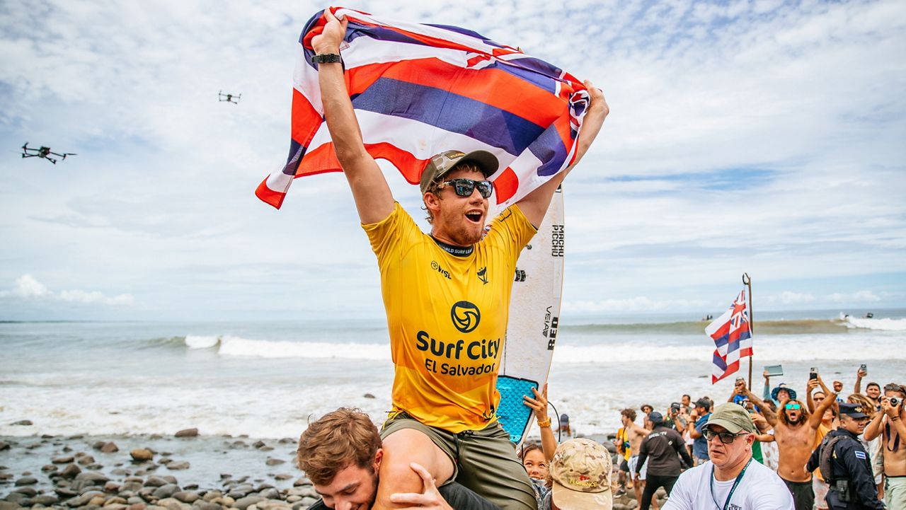 John John Florence raised the Hawaiian flag after winning the final at the Surf City El Salvador Pro at Punta Roca, La Libertad in the Central American nation on Sunday.