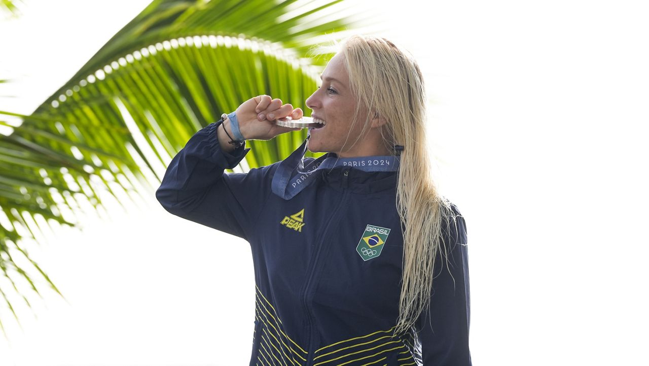 Kauai resident Tatiana Weston-Webb celebrated with her surfing silver medal for Brazil after the competition at the 2024 Summer Olympics at in Teahupo'o, Tahiti.