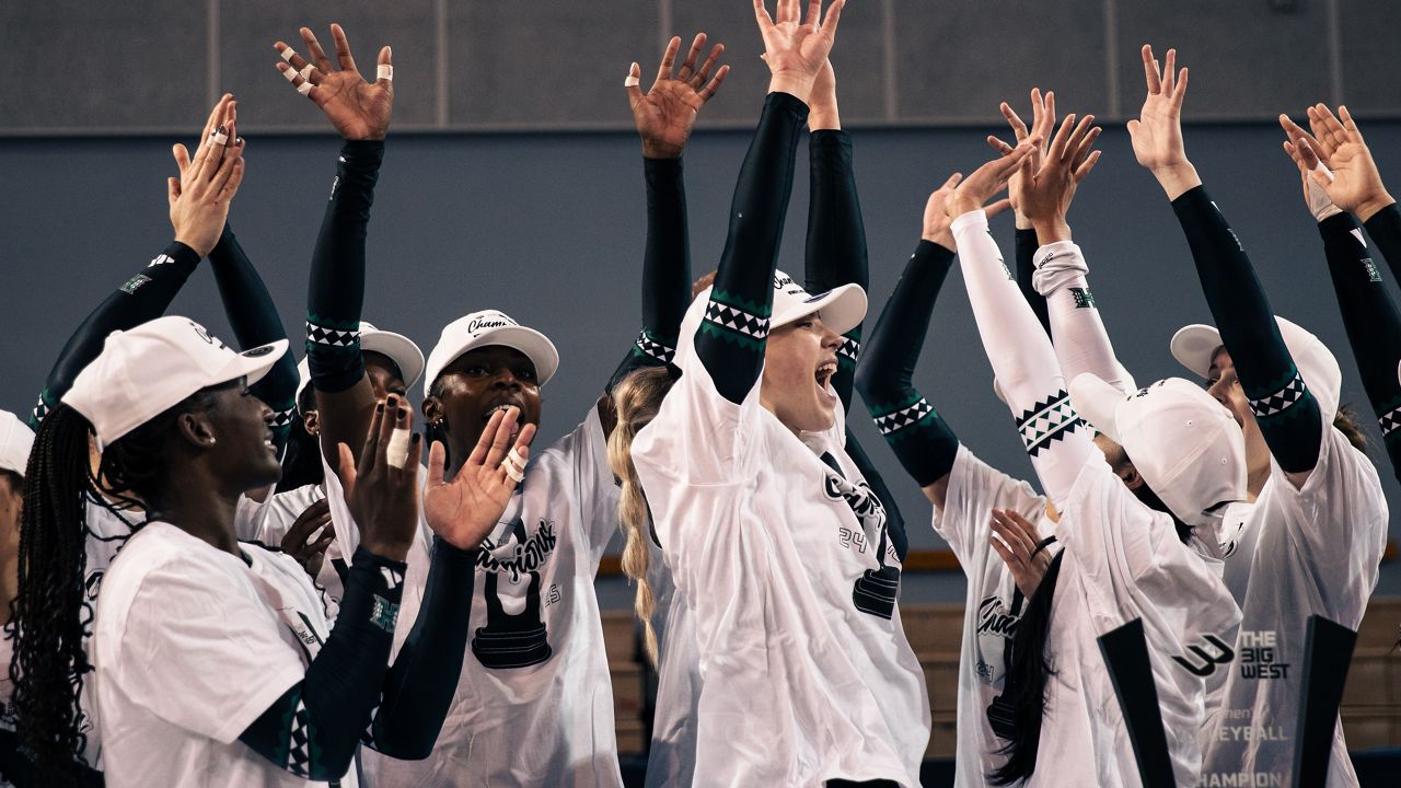 The Hawaii women's volleyball team celebrated its Big West tournament championship following a four-set win over Cal Poly in Irvine, Calif., on Saturday.