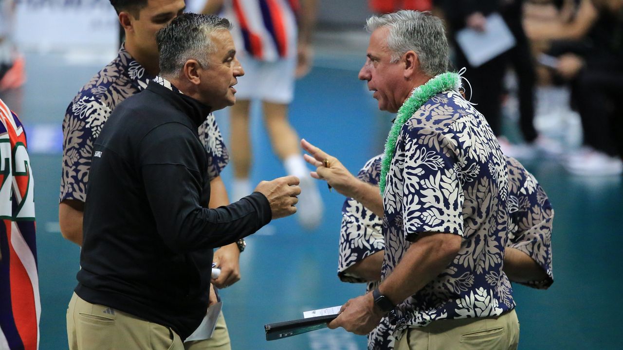 Hawaii men's volleyball coach Charlie Wade, right, had an animated discussion with assistant coach Milan Zarkovic during a timeout in Saturday's four-set loss to CSUN.