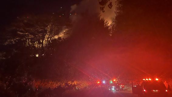 The Wainiha fire on Wednesday night. (Photo courtesy of Kauai Fire Department)