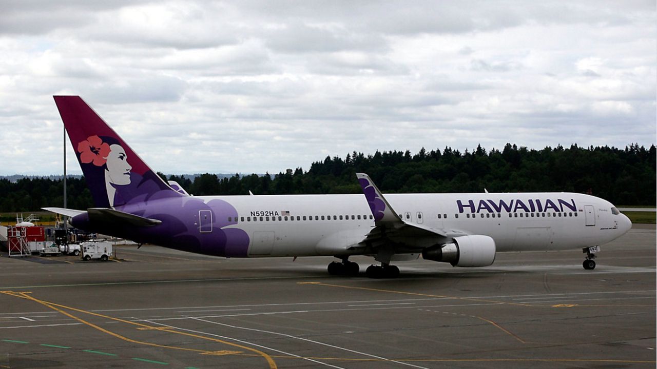 The airline’s new program offers Hawaii residents a free checked bag, 10-20% off on neighbor island bookings and more. (AP Photo/Ted S. Warren)