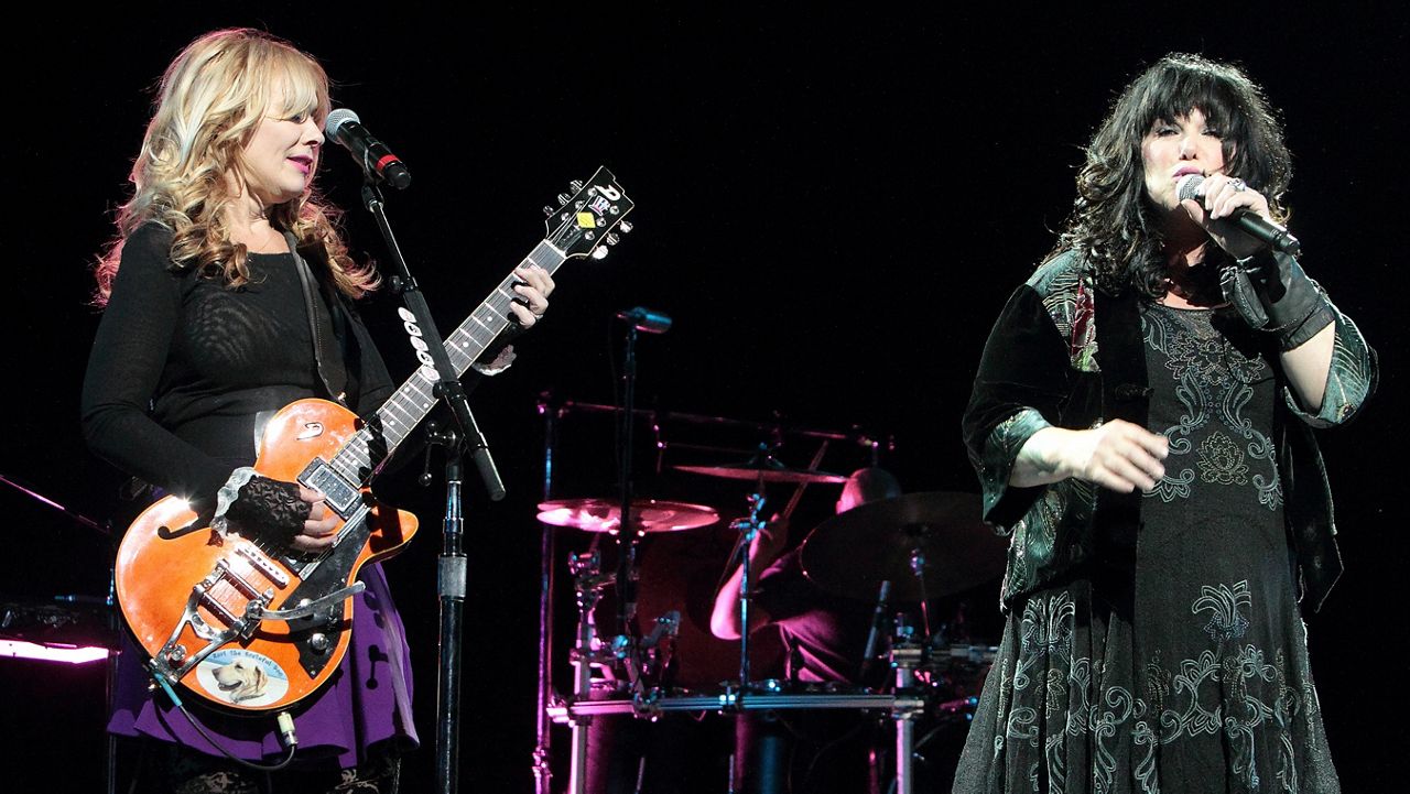 Nancy and Ann Wilson of the classic rock band Heart perform in concert at the American Music Theater on Monday, March 24, 2014, in Lancaster, Pa. (Photo by Owen Sweeney/Invision/AP)