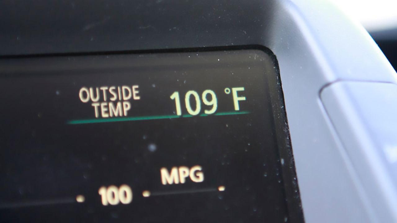 Hot temperature displayed on a car thermometer. (AP Images)