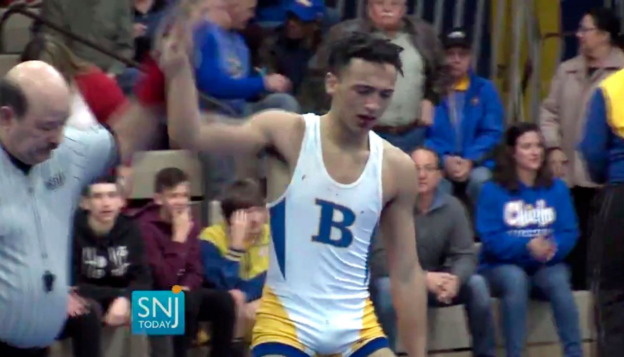 Olympic wrestler slams high school wrestler's haircut