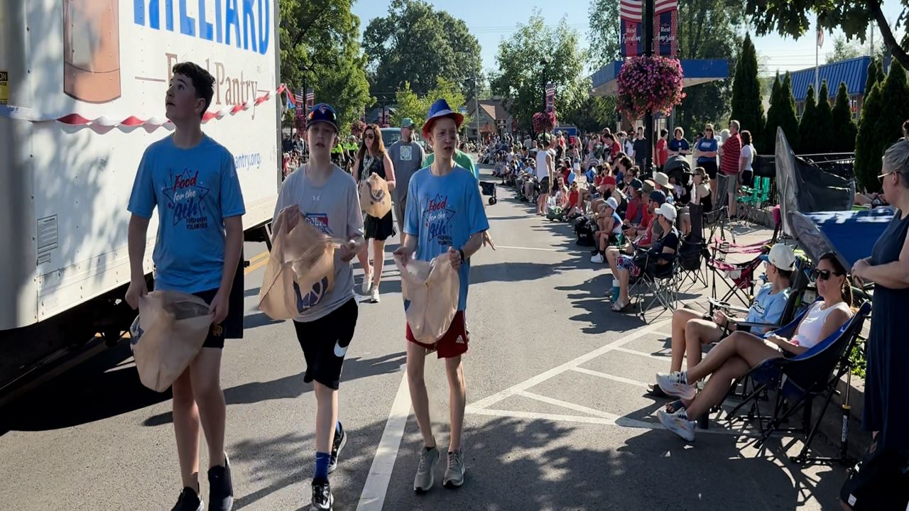 Hilliard Food Pantry Plus participates in the city's Fourth of July parade to raise donations and support for families. (Spectrum News 1/Saima Khan). 