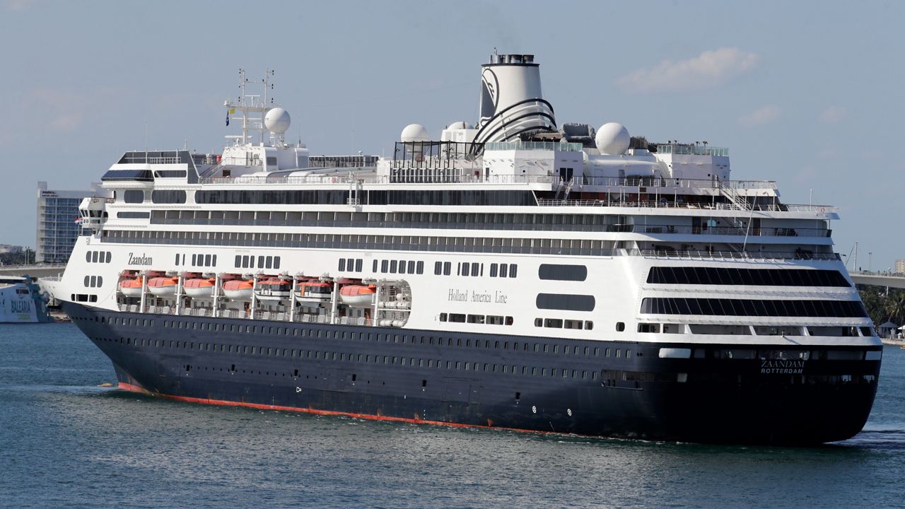 A Holland America cruise ship Zaandam arrives at Port Everglades during the new coronavirus pandemic, Thursday, April 2, 2020, in Fort Lauderdale, Fla. (AP Photo/Lynne Sladky)