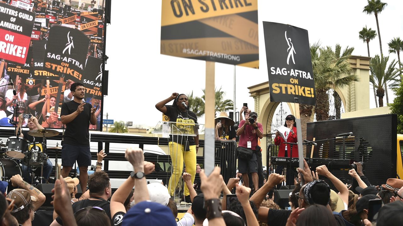 FILE - SAG-AFTRA member Sheryl Lee Ralph speaks during a rally outside Paramount Pictures Studio on Wednesday, Sept. 13, 2023, in Los Angeles. The film and television industries remain paralyzed by Hollywood's dual actors and screenwriters strikes. (Photo by Richard Shotwell/Invision/AP)