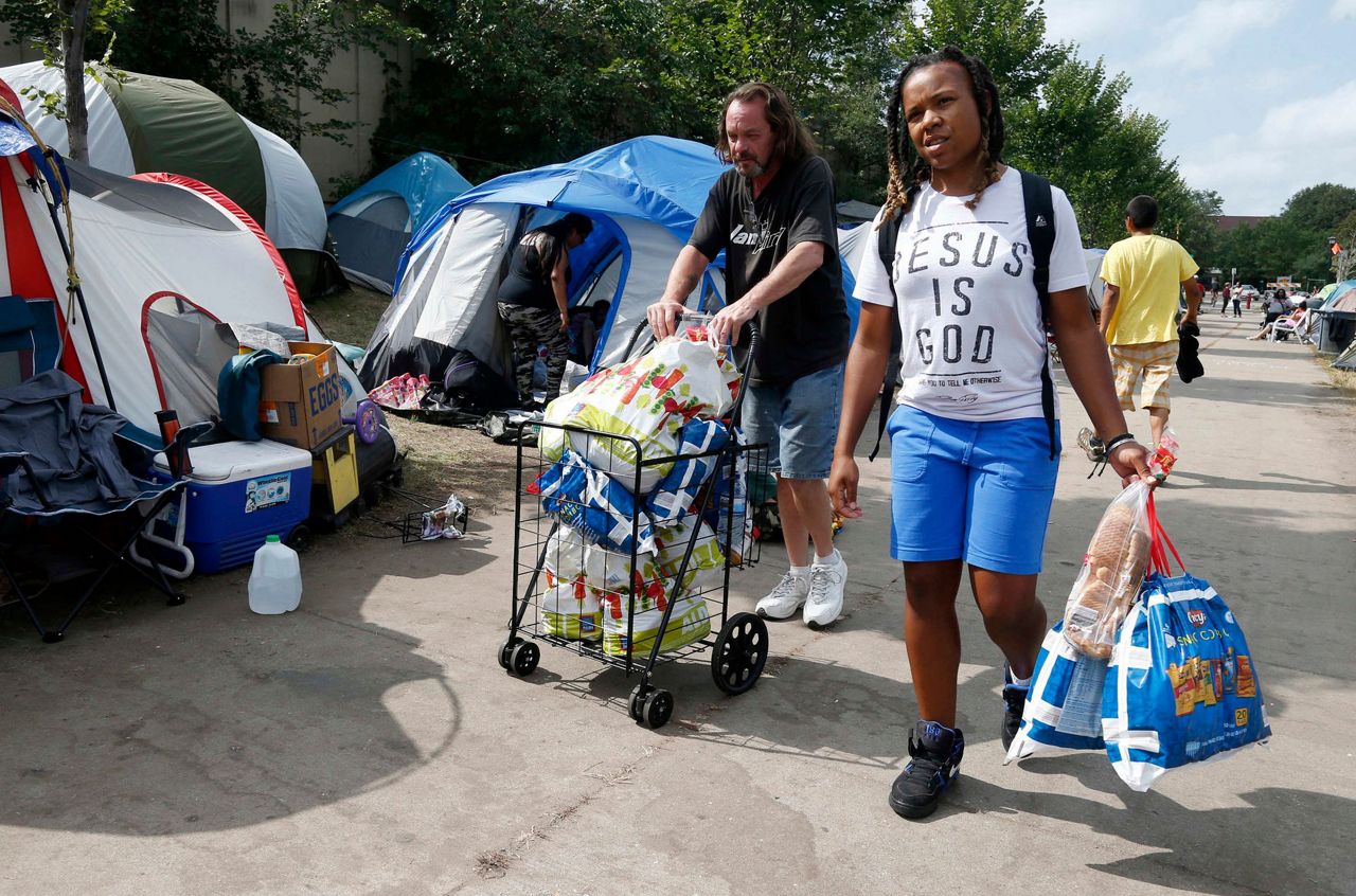 In Minneapolis, leaders grapple with sudden homeless camp