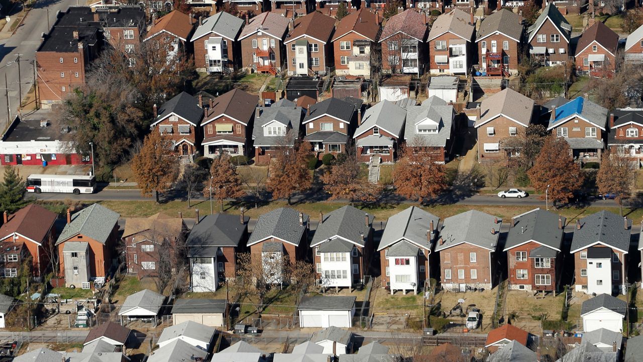 Rows of modest houses are seen in Jennings, Mo. in this aerial photo taken Tuesday, Nov. 25, 2014. (AP Photo/Charlie Riedel)