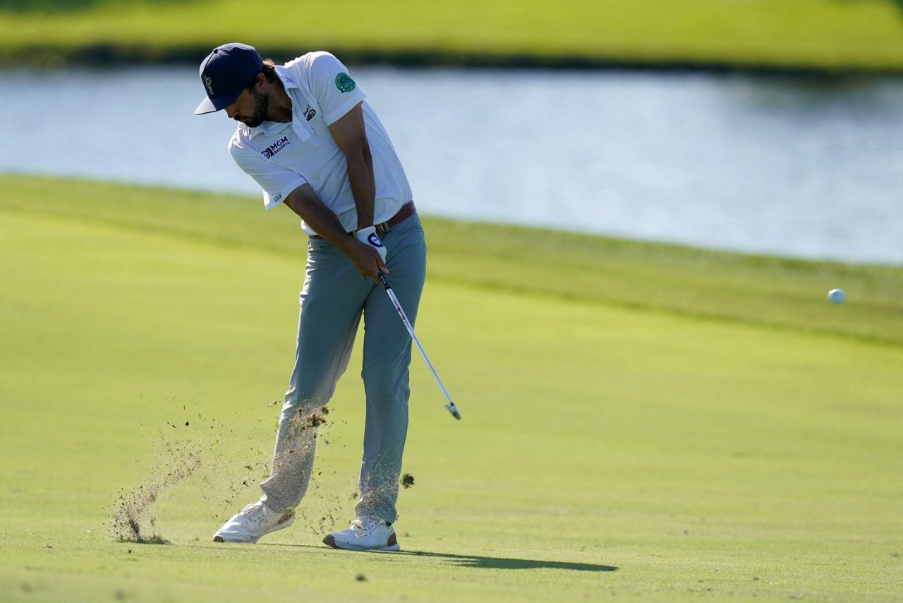 Berger shoots another 65, moves atop Honda leaderboard