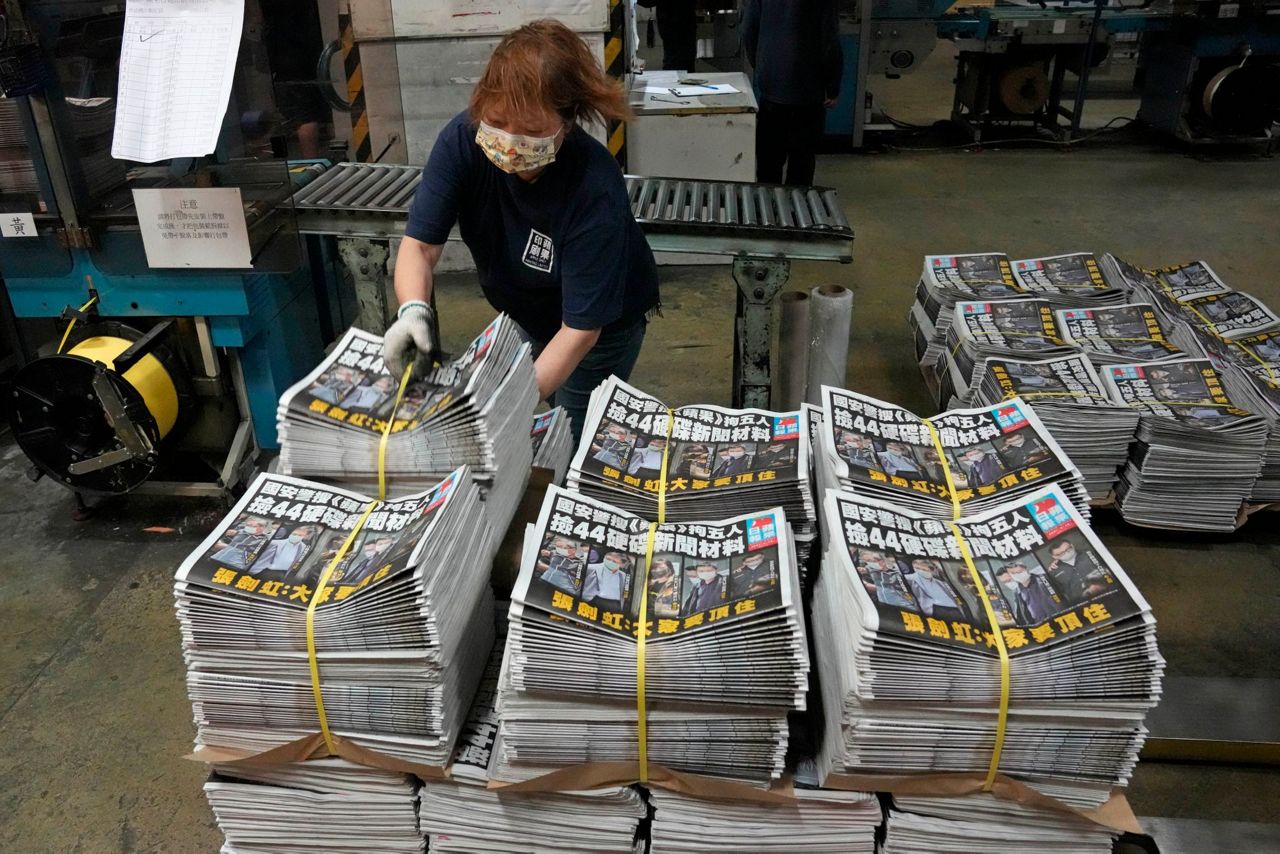 Hong Kong's Apple Daily newspaper says it may shut down