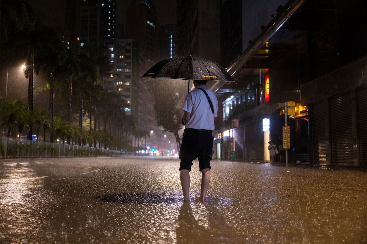 Hong Kong closes schools as torrential rain floods streets, subway station