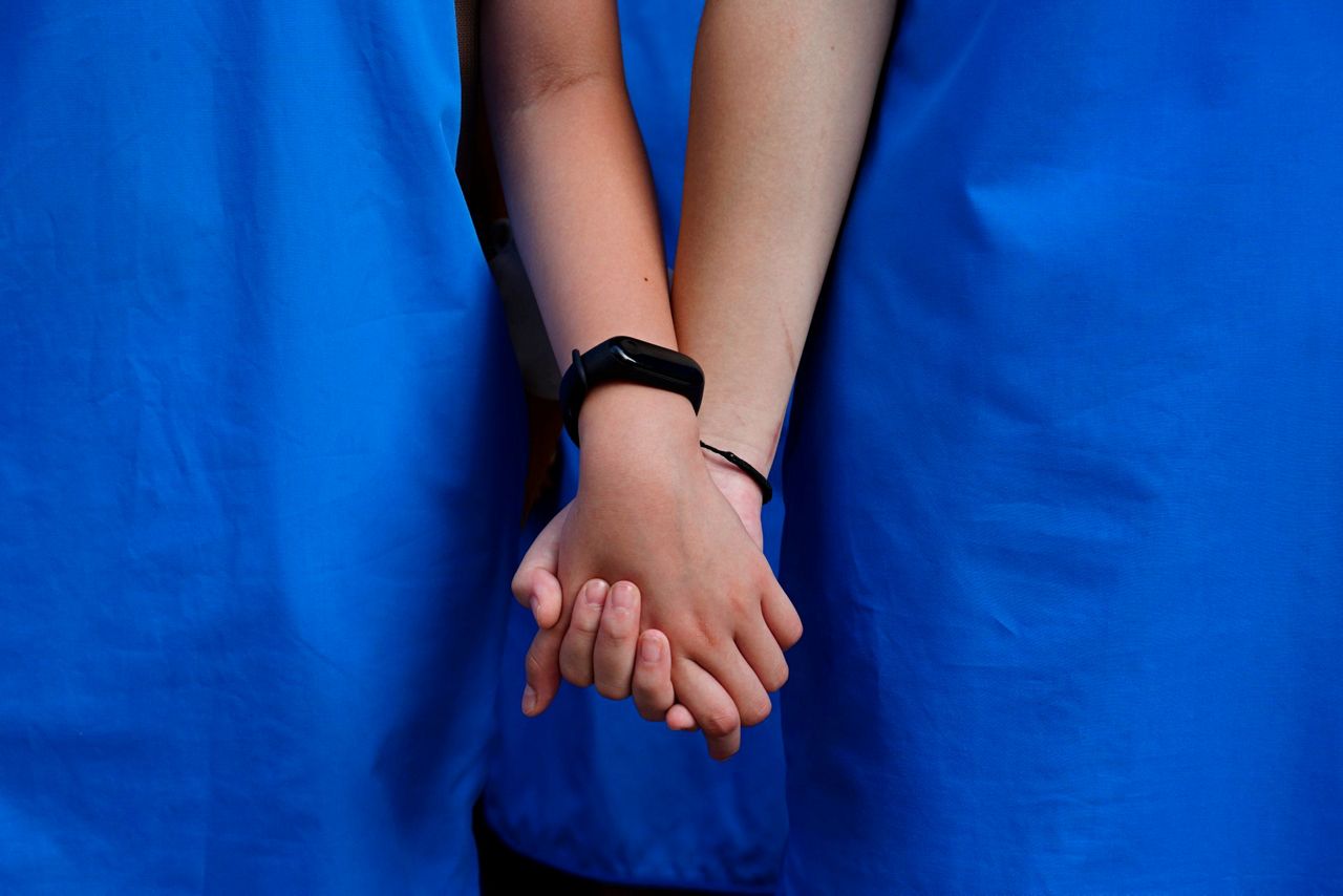 Hong Kong tells US to stay out, students form protest chains