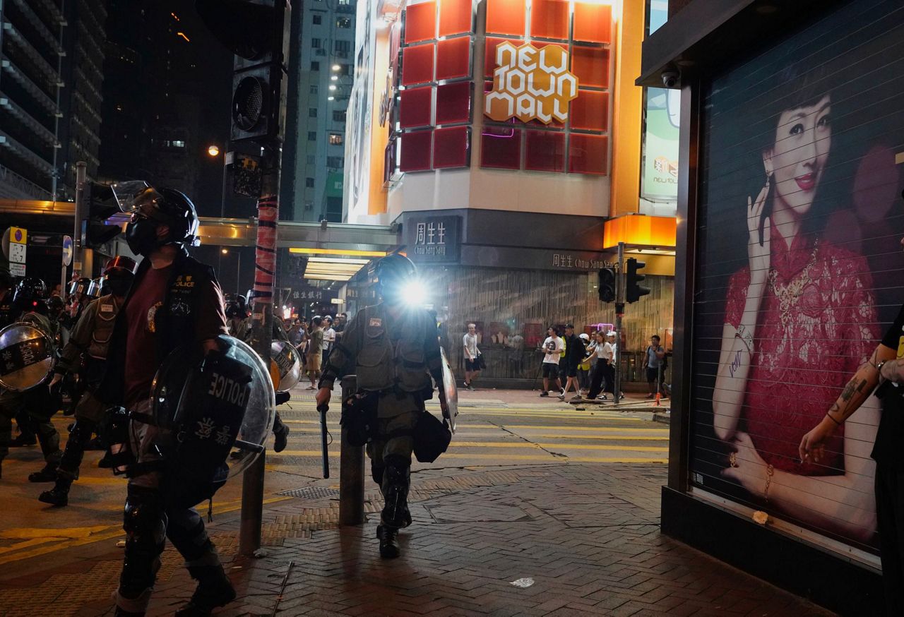 Hong Kong rally targets police conduct, use of dogs