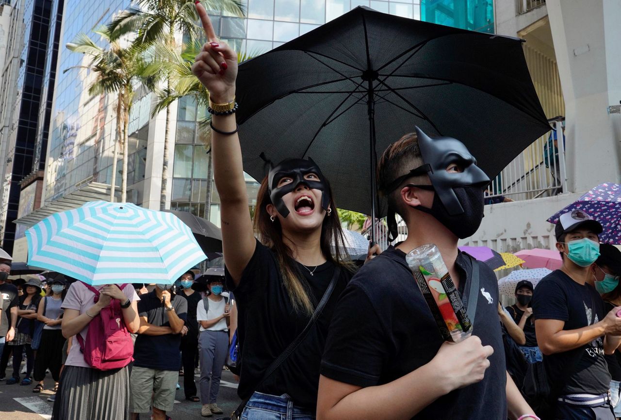 Hong Kong suspends trains, appeals to public after rioting