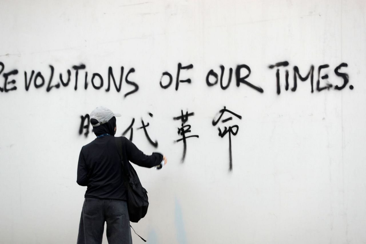 Hong Kong police say protests off designated route illegal