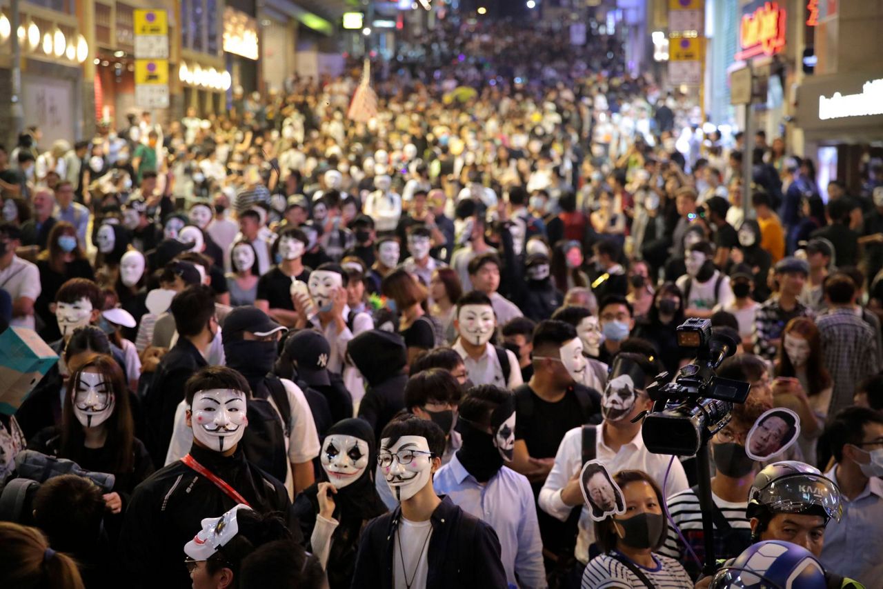 Hong Kong Halloween protest rally aims to test mask ban