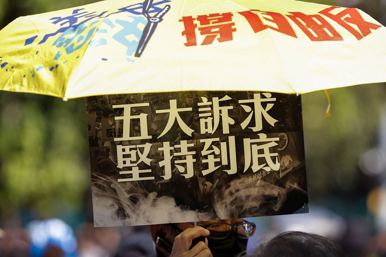 Hong Kong protests cross half-year mark with rally